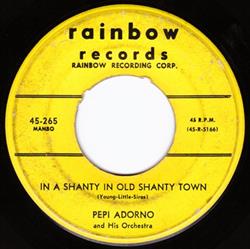 Download Pepi Adorno And His Orchestra - In A Shanty In Old Shanty Town Mambo Around The World
